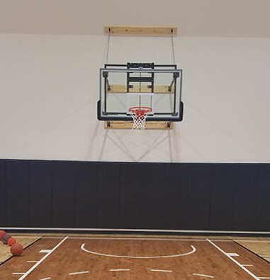 Gared Stationary Four-Point Wall Mount Basketball Hoop with Glass Board and Electric Height Adjuster