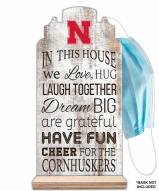 Nebraska Cornhuskers In This House Mask Holder